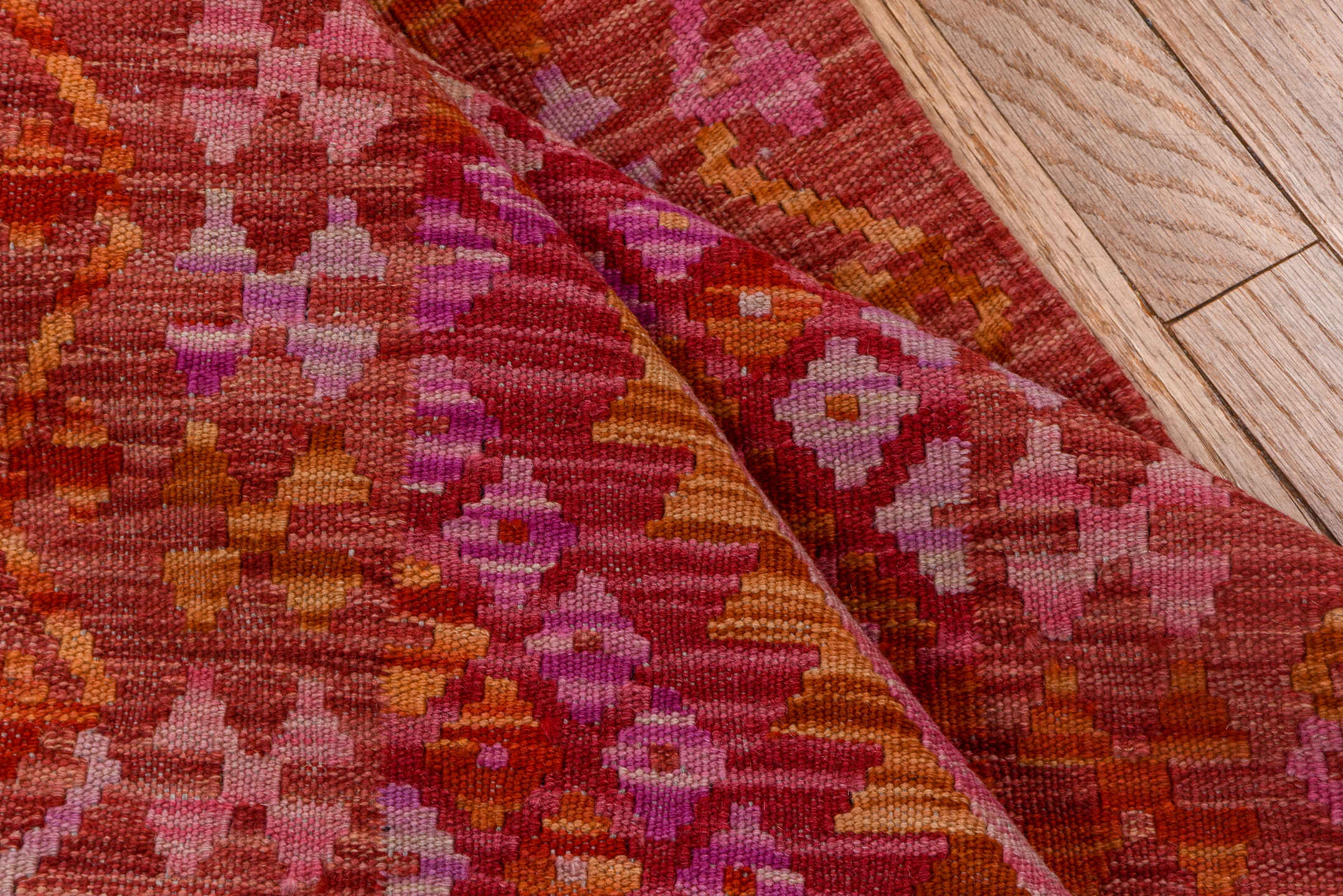 2' x 9' one-of-a-kind handmade vintage Kilim runner rug. Color palette: rose, pink, rust, magenta, terra cotta, ivory