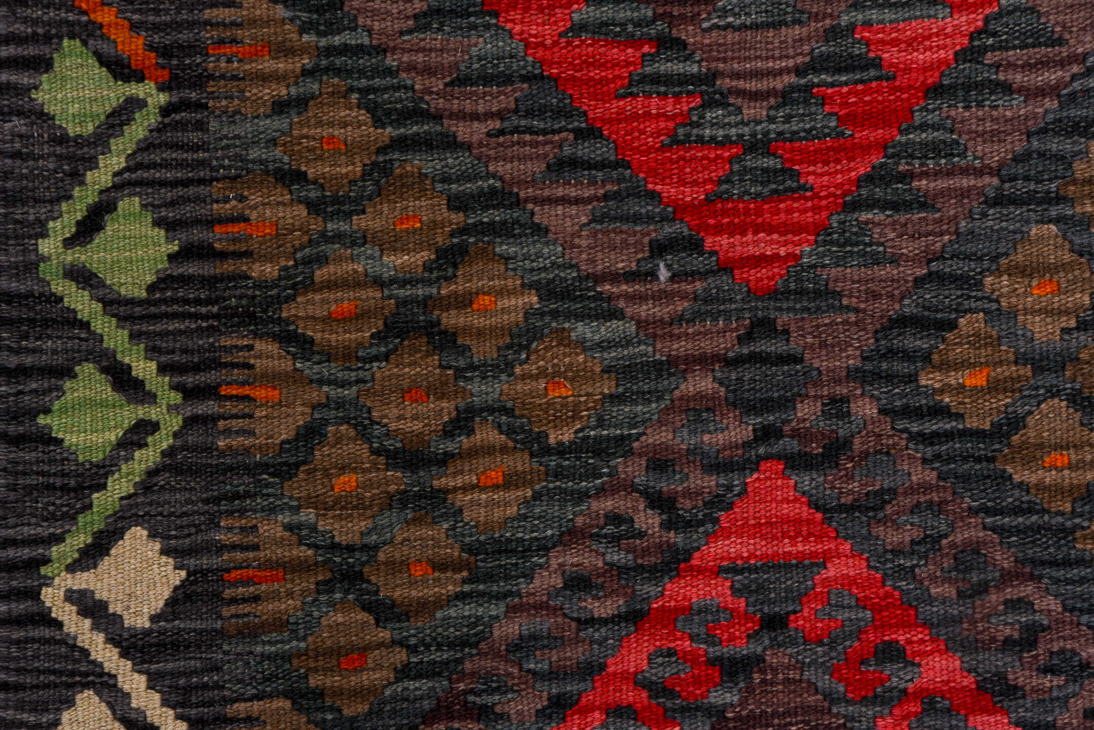 2' x 9' one-of-a-kind handmade vintage Kilim runner rug. Color palette: charcoal, crimson, rust, turquoise, ivory, gold