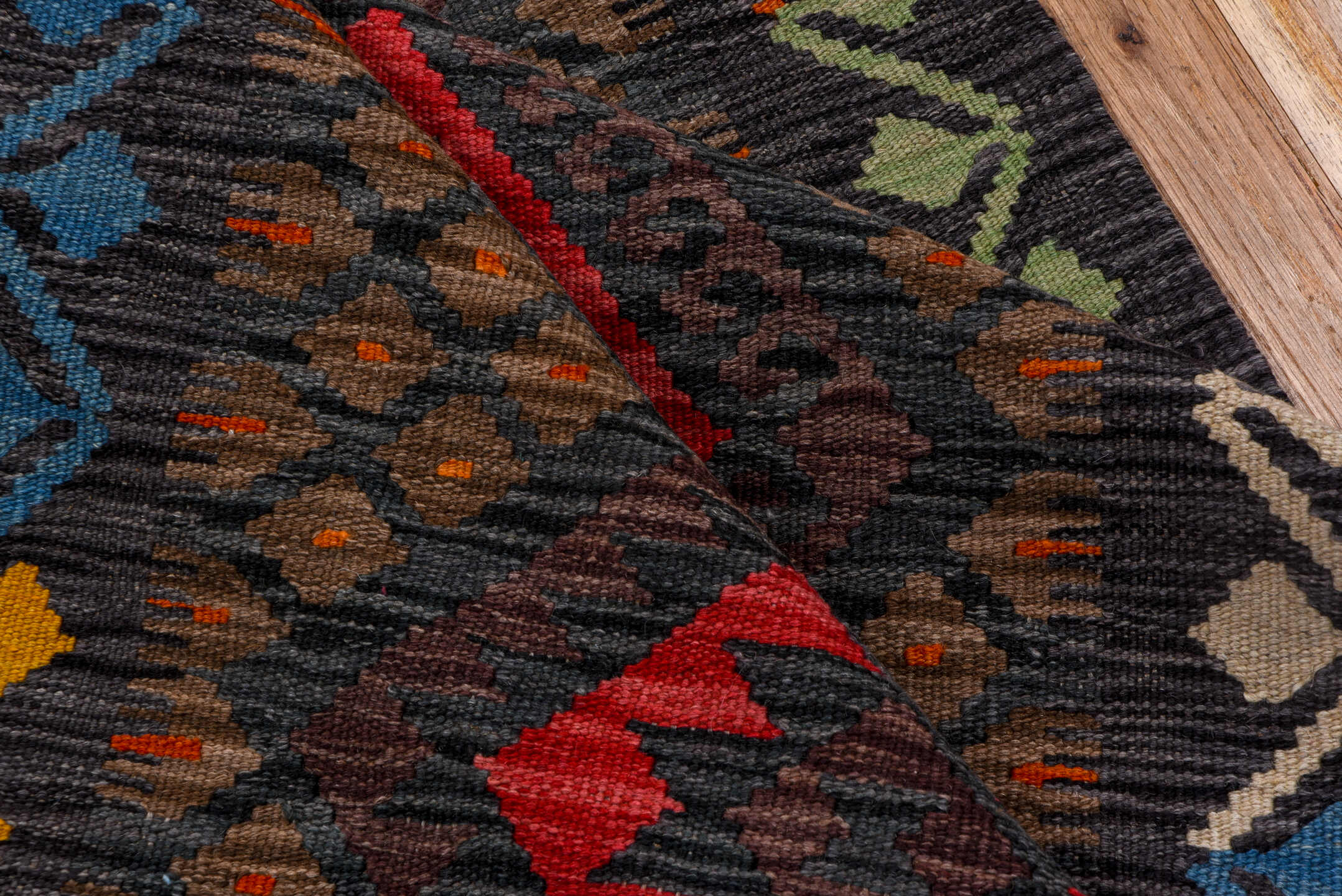 2' x 9' one-of-a-kind handmade vintage Kilim runner rug. Color palette: charcoal, crimson, rust, turquoise, ivory, gold