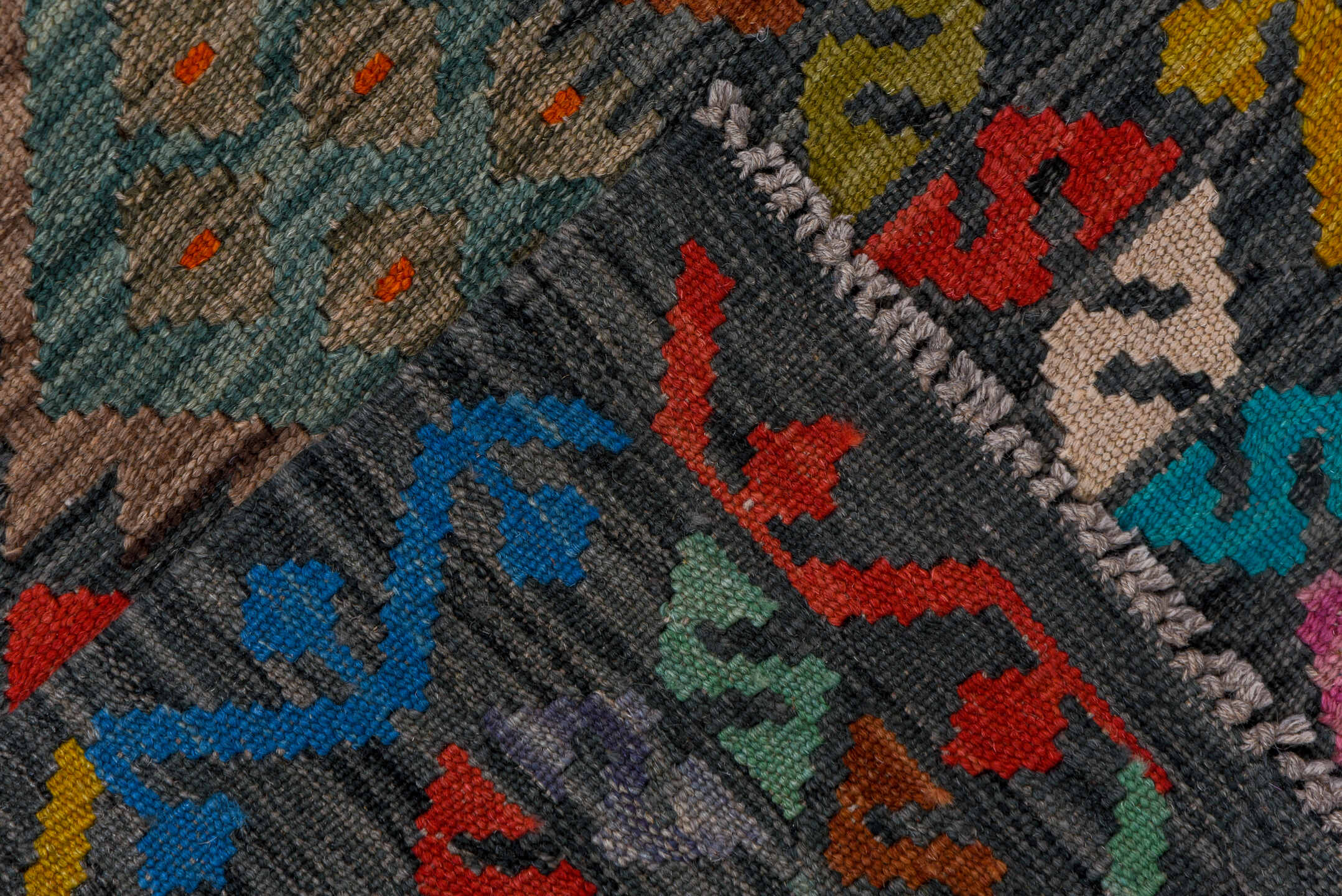 2' x 9' one-of-a-kind handmade vintage Kilim runner rug. Color palette: black, blue, brown, charcoal, gray, pink, red