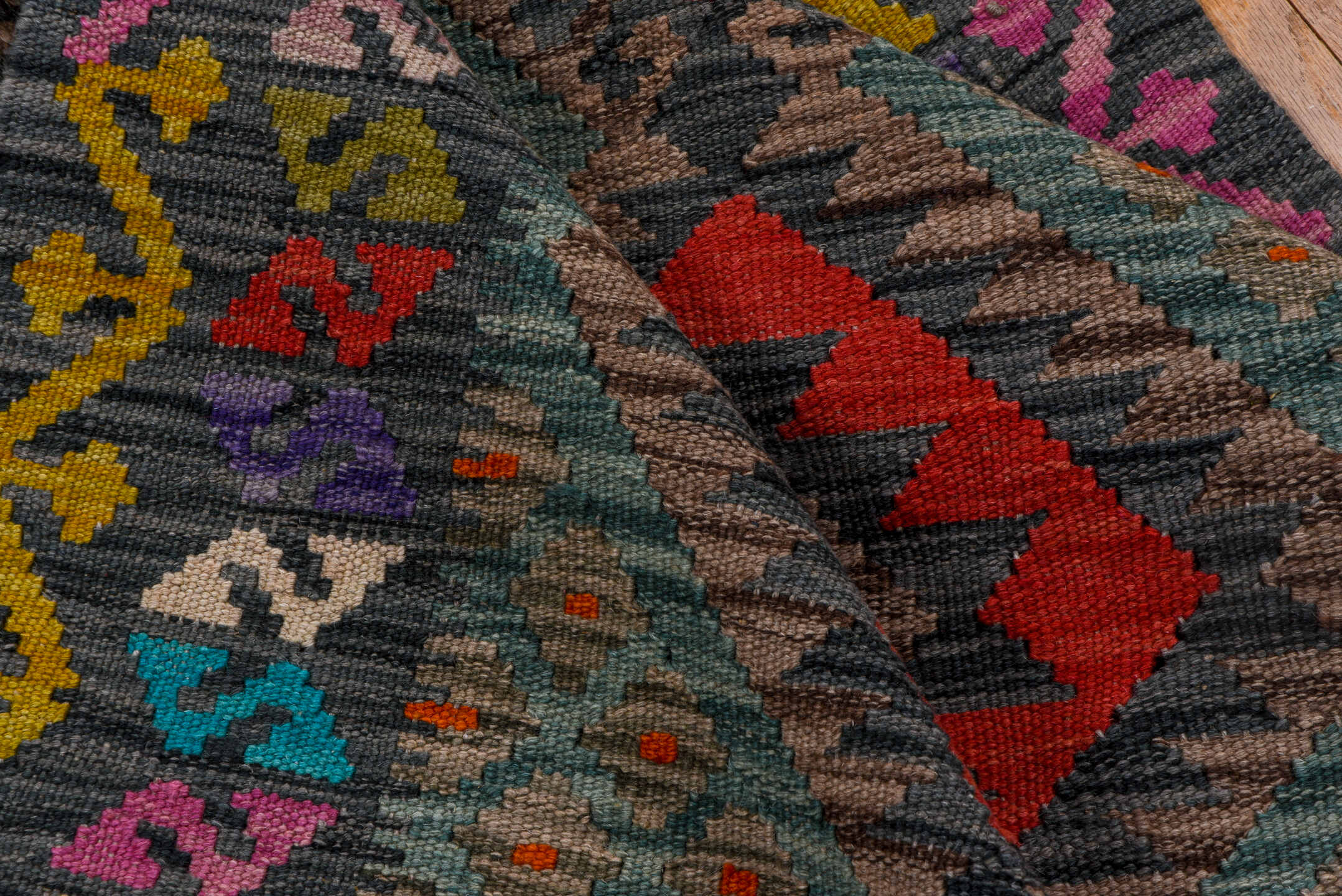 2' x 9' one-of-a-kind handmade vintage Kilim runner rug. Color palette: black, blue, brown, charcoal, gray, pink, red