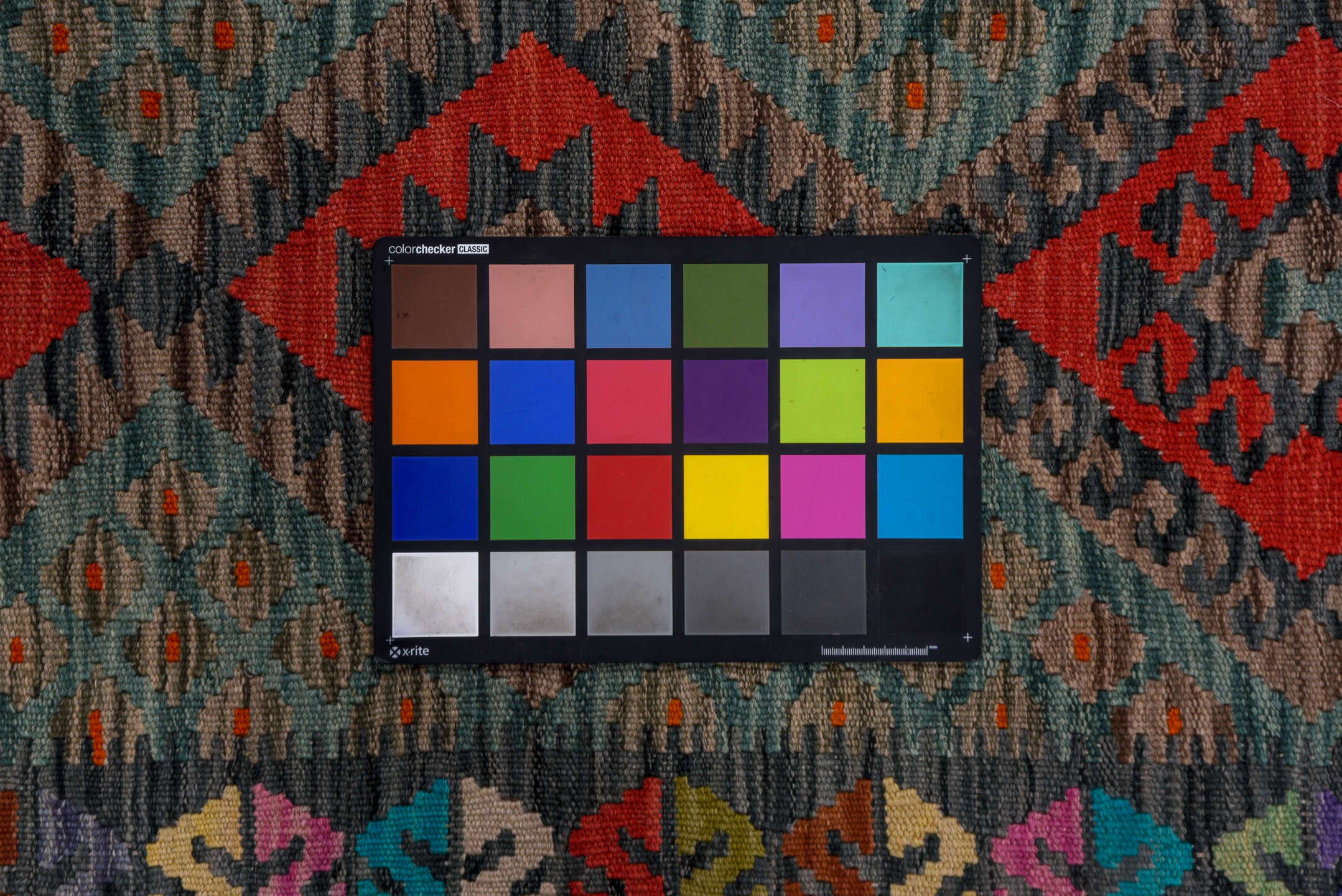 2' x 9' one-of-a-kind handmade vintage Kilim runner rug. Color palette: teal, charcoal, crimson, cobalt, taupe, lavender