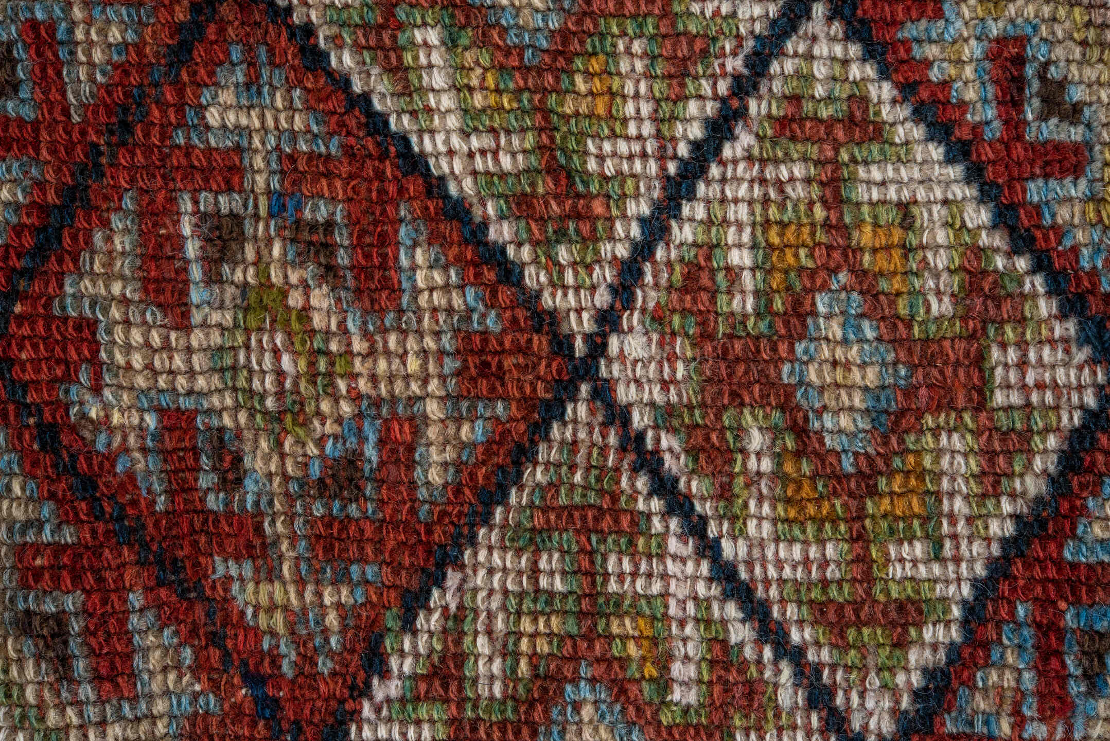 4' x 8' one-of-a-kind handmade antique Kurd rug. Color palette: camel, ivory, rust, sky blue, navy, taupe, gold, brown