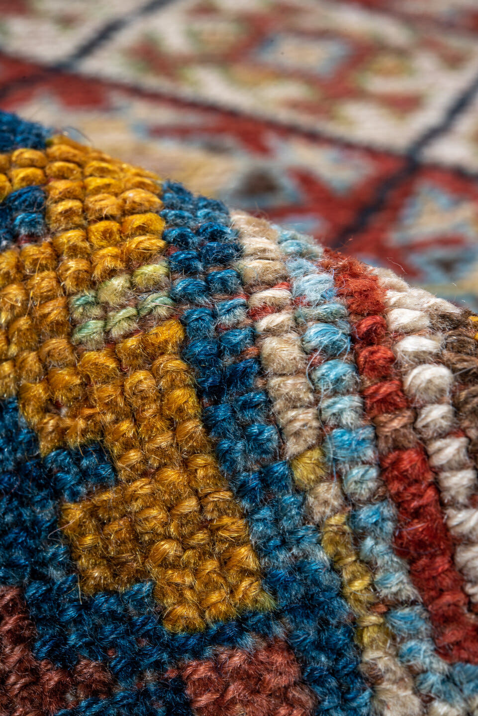 4' x 8' one-of-a-kind handmade antique Kurd rug. Color palette: camel, ivory, rust, sky blue, navy, taupe, gold, brown