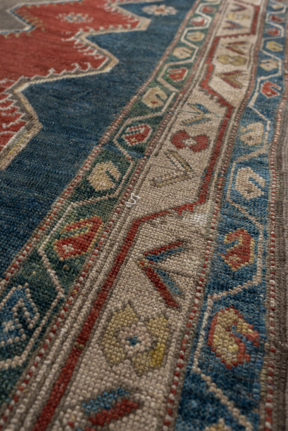 5' x 8' one-of-a-kind handmade antique Caucasian medium size rug. Color palette: teal, rust, ivory, taupe, terracotta, ochre