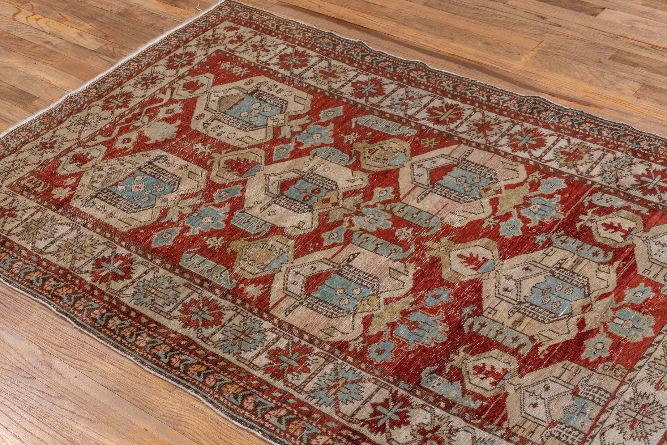 3' x 5' one-of-a-kind handmade antique Shirvan small size rug. Color palette: rust, ivory, sky blue, brown, taupe, camel