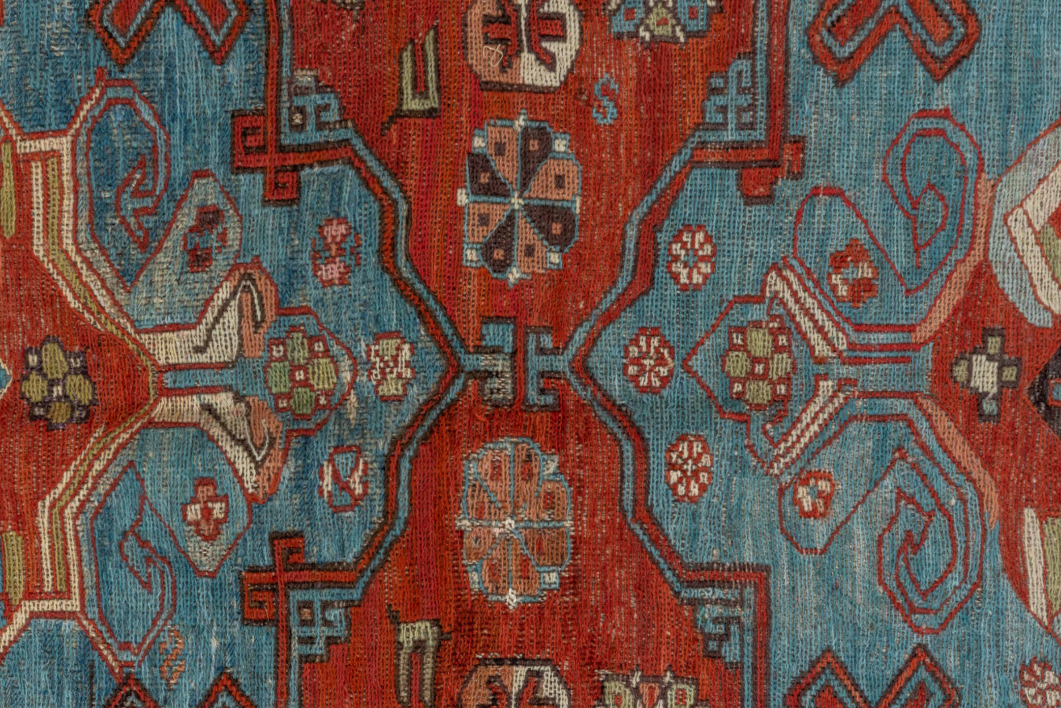 6' x 8' one-of-a-kind handmade antique Sumak medium size rug. Color palette: rust, sky blue, ivory, charcoal, camel