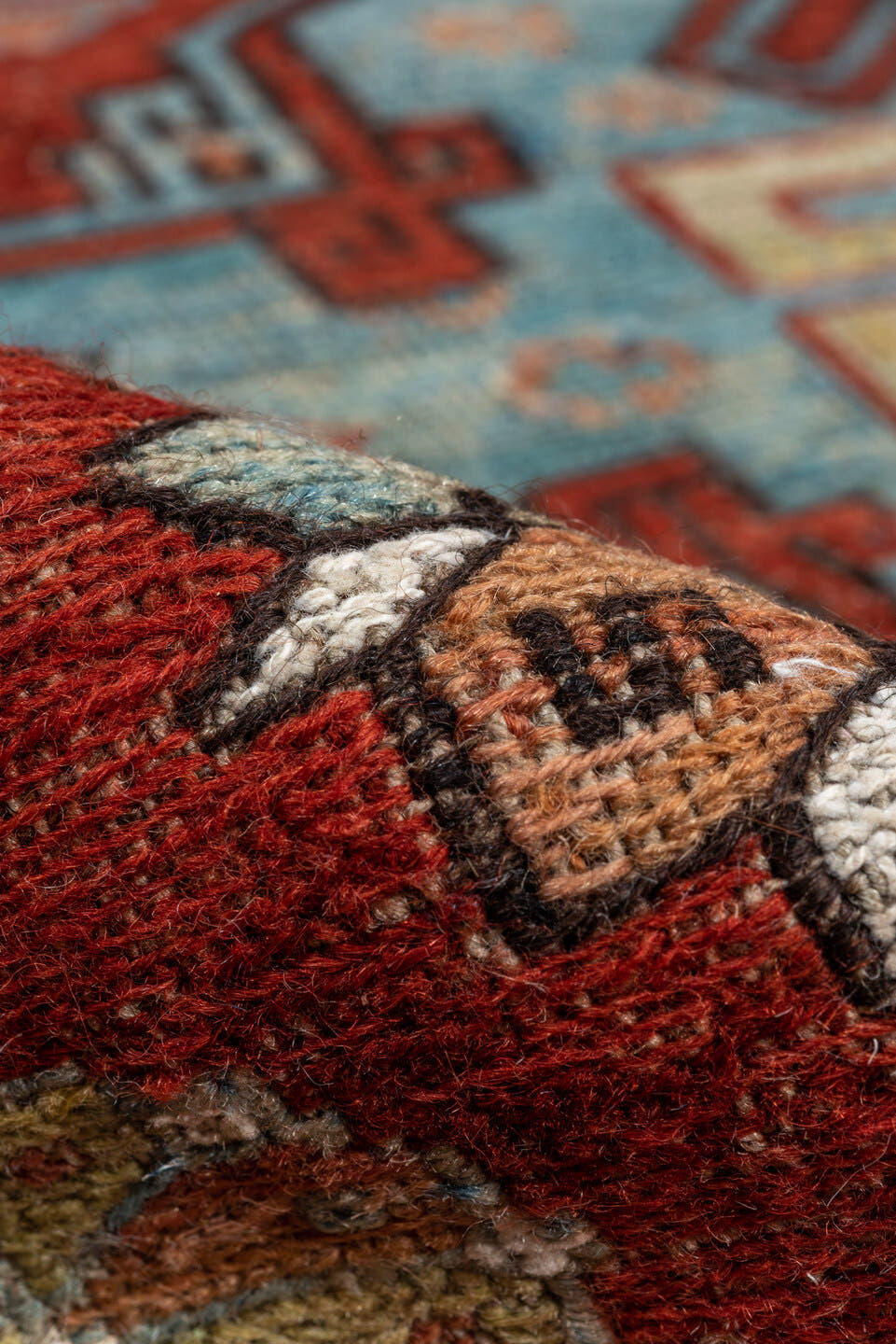 6' x 8' one-of-a-kind handmade antique Sumak medium size rug. Color palette: rust, sky blue, ivory, charcoal, camel