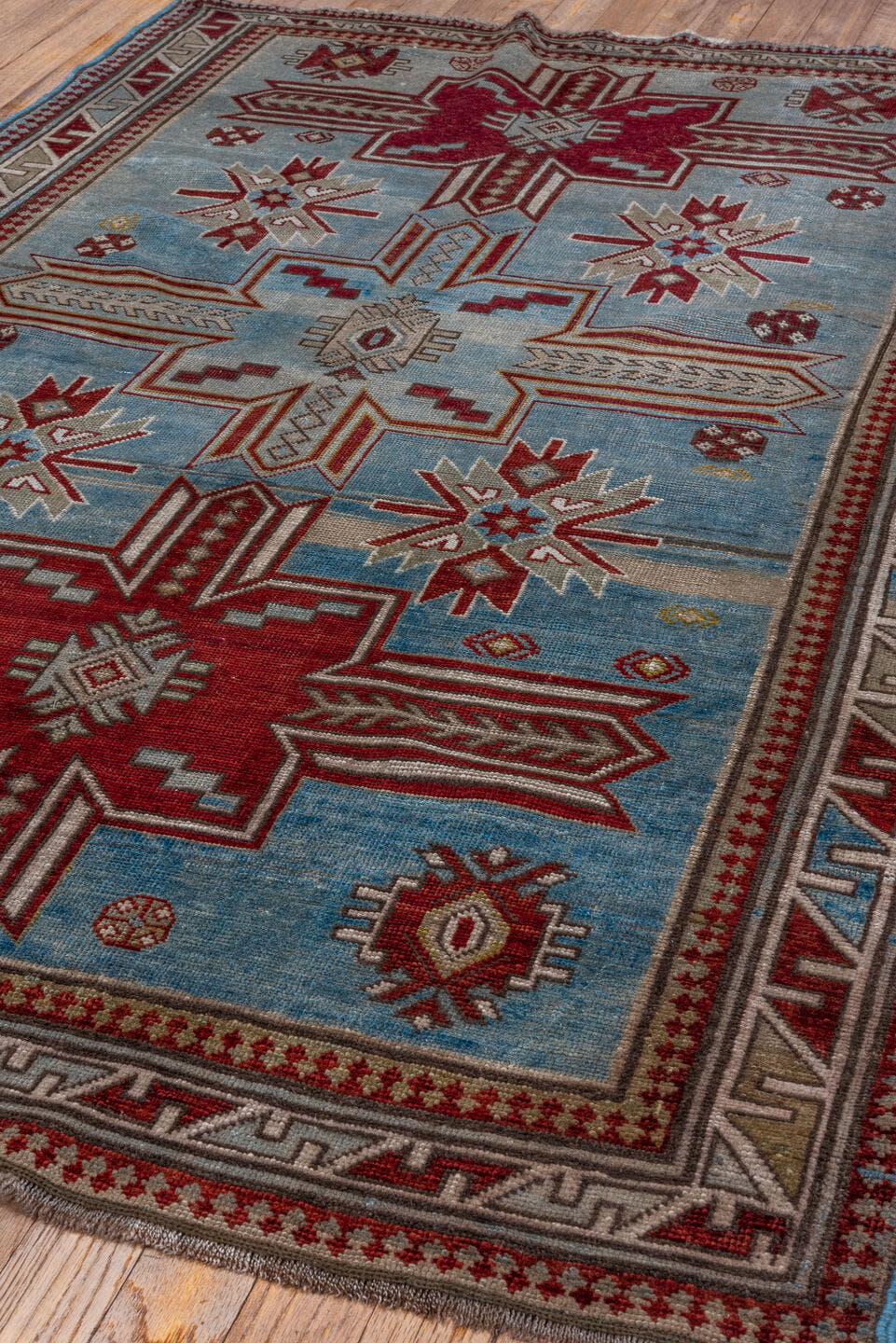 3' x 5' one-of-a-kind handmade antique Shirvan small size rug. Color palette: sky blue, ivory, crimson, burgundy, camel
