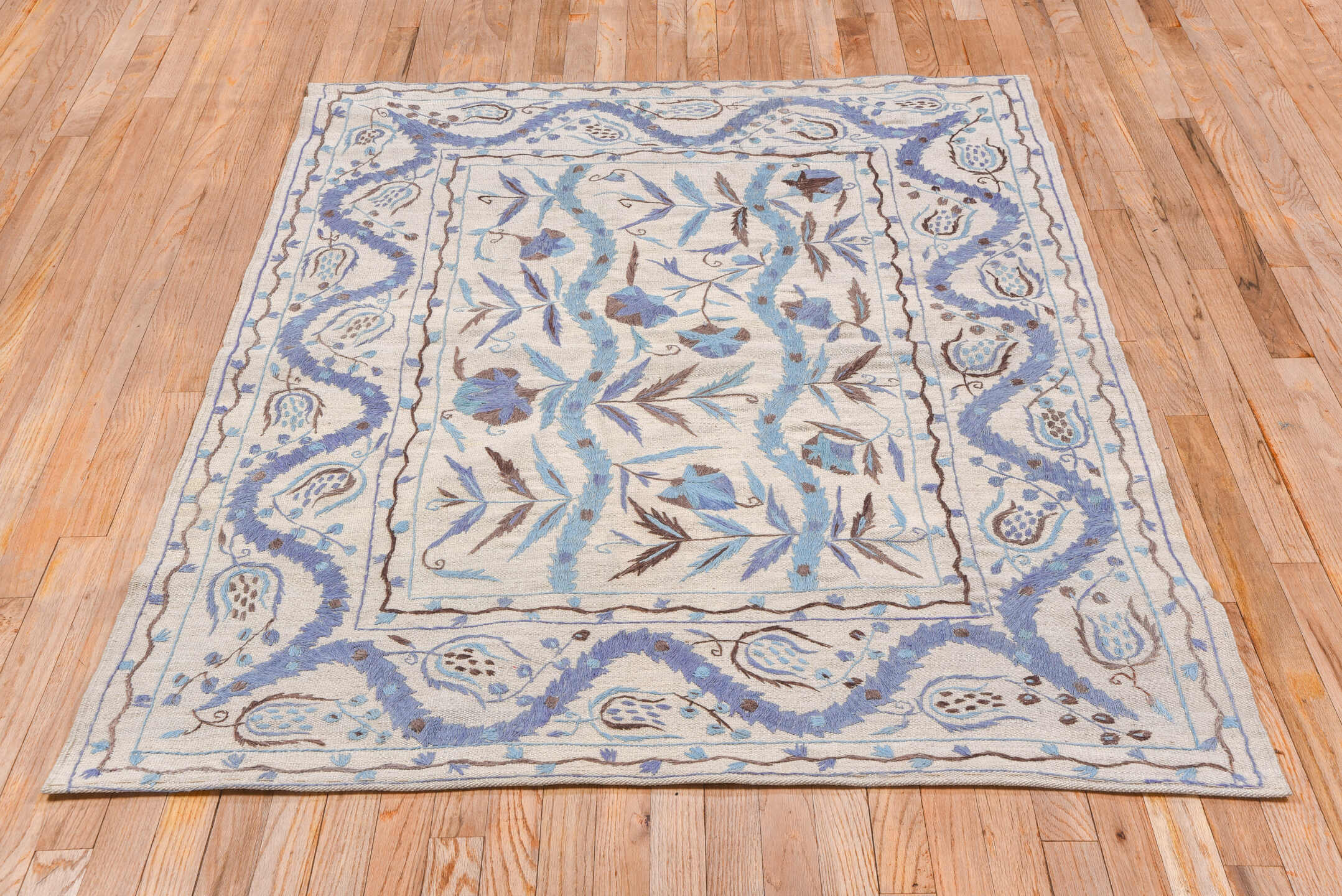 4' x 5' one-of-a-kind handmade vintage Kilim small size rug. Color palette: ivory, sky blue, lavender, taupe, brown