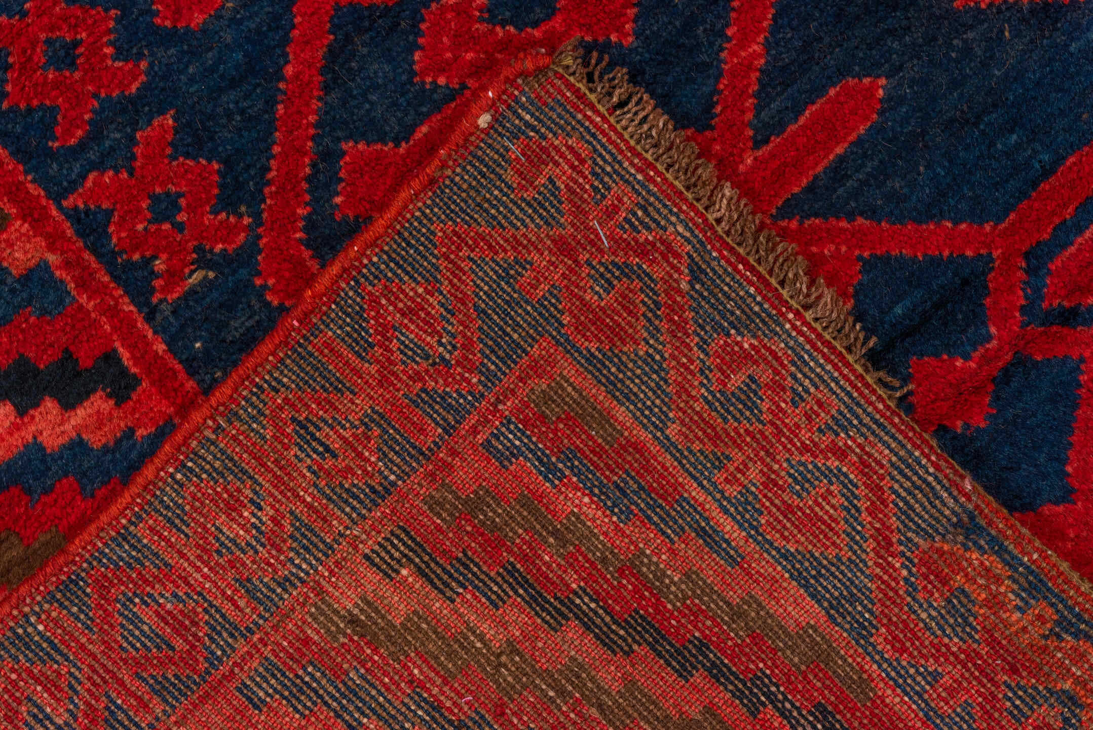 4' x 10' one-of-a-kind handmade antique Khotan runner rug. Color palette: crimson, navy, burgundy, indigo, red, blue, purple