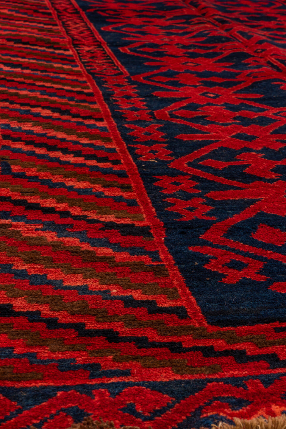 4' x 10' one-of-a-kind handmade antique Khotan runner rug. Color palette: crimson, navy, burgundy, indigo, red, blue, purple