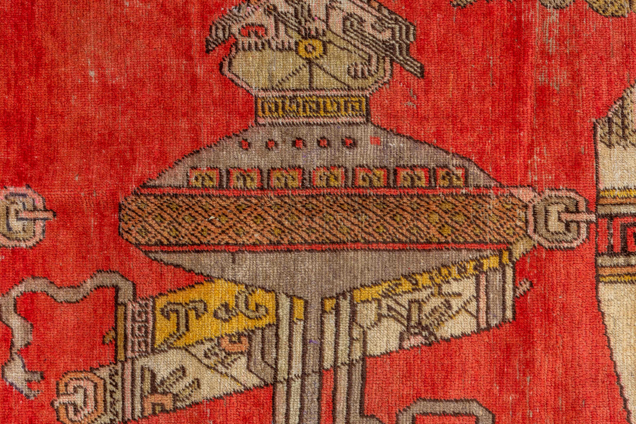 4' x 8' one-of-a-kind handmade vintage Khotan rug. Color palette: brown, dark salmon, orange, pink, red, yellow