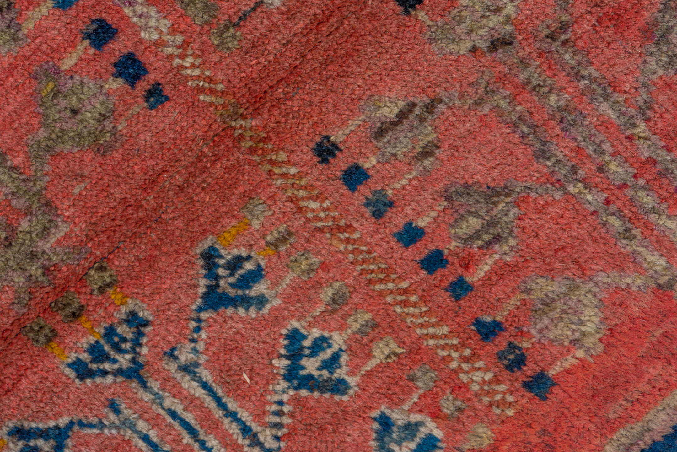 2' x 4' one-of-a-kind handmade antique Khotan small size rug. Color palette: coral, navy, camel, ivory, terra cotta, slate