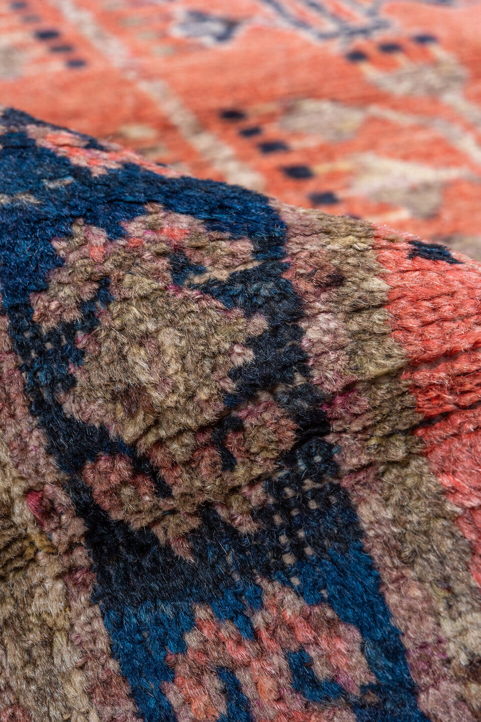 2' x 4' one-of-a-kind handmade antique Khotan small size rug. Color palette: coral, navy, camel, ivory, terra cotta, slate