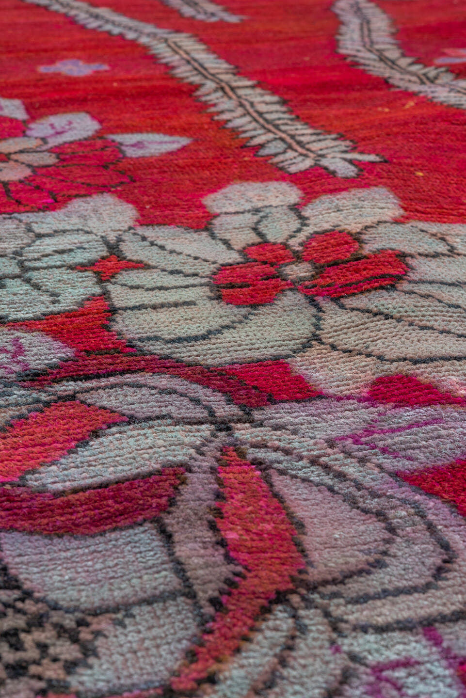 5' x 10' one-of-a-kind handmade antique Khotan medium size rug. Color palette: crimson, raspberry, ivory, lavender