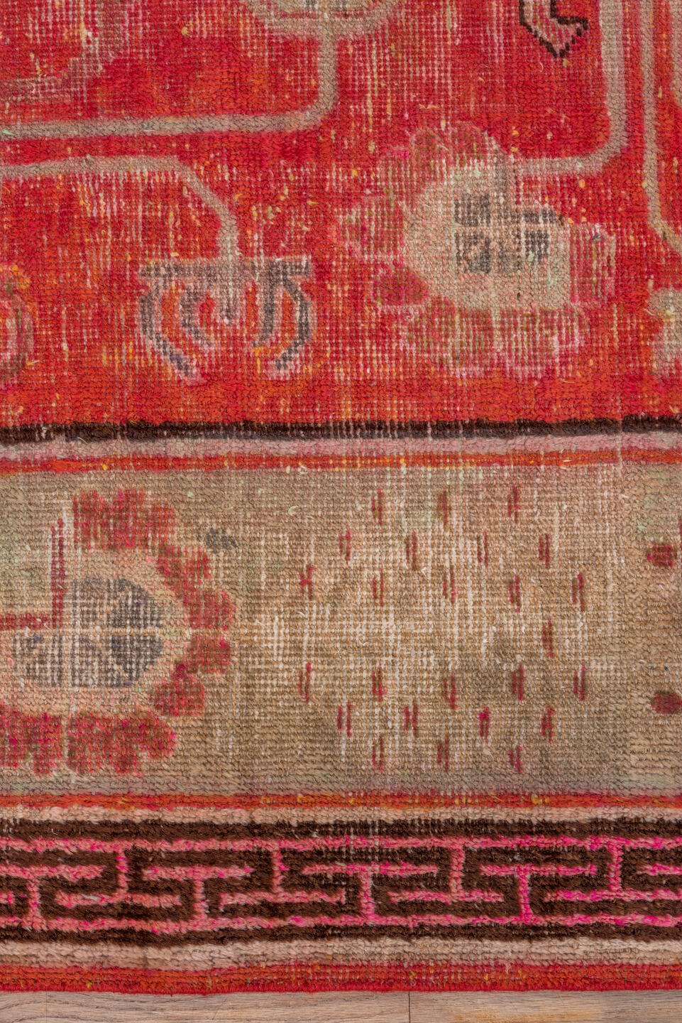 5' x 10' one-of-a-kind handmade vintage Khotan runner rug. Color palette: brown, fire brick, light coral, off-white, pink