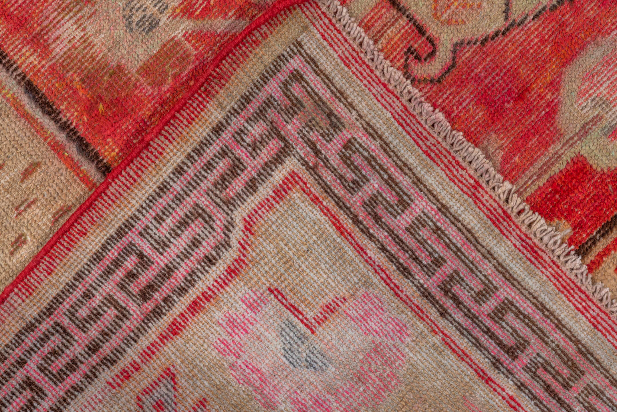 5' x 10' one-of-a-kind handmade vintage Khotan runner rug. Color palette: brown, fire brick, light coral, off-white, pink