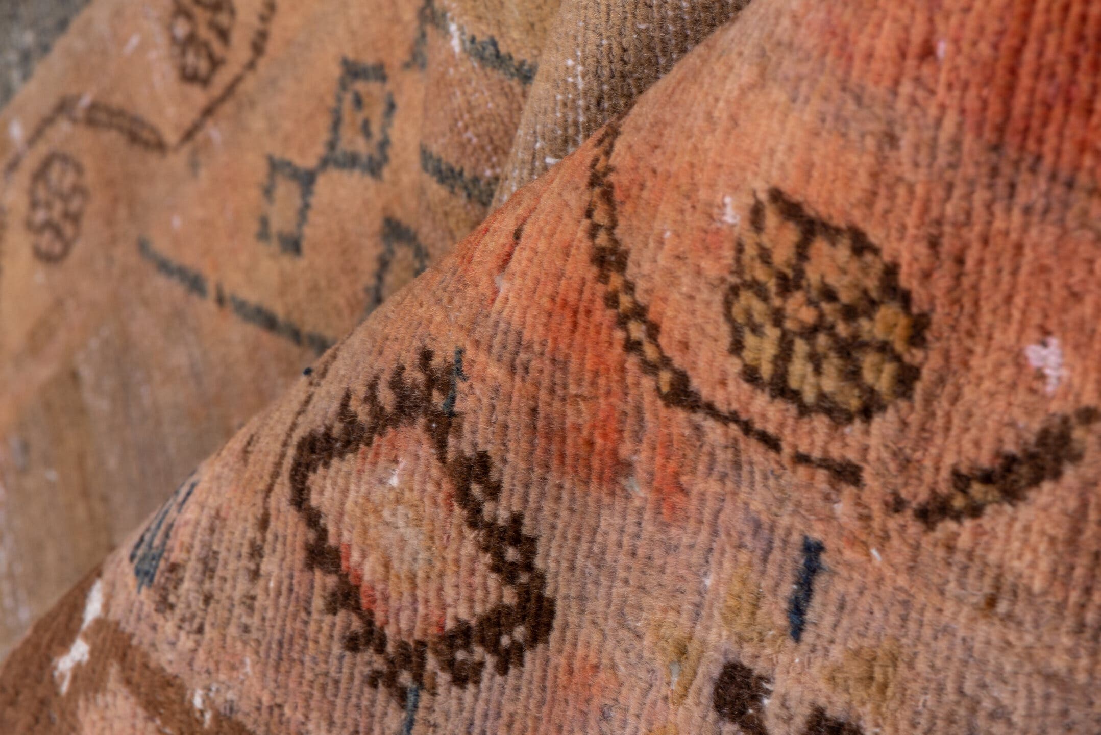 4' x 9' one-of-a-kind handmade vintage Distressed runner rug. Color palette: taupe, terra cotta, brown, charcoal, camel