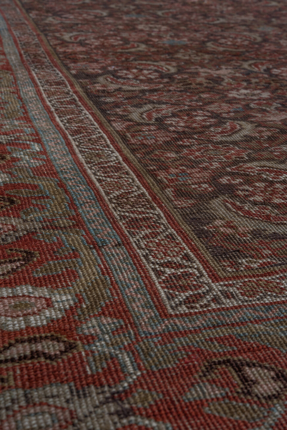4' x 6' one-of-a-kind handmade vintage Bidjar small size rug. Color palette: black, blue, brown, gray, pink, red, redwood