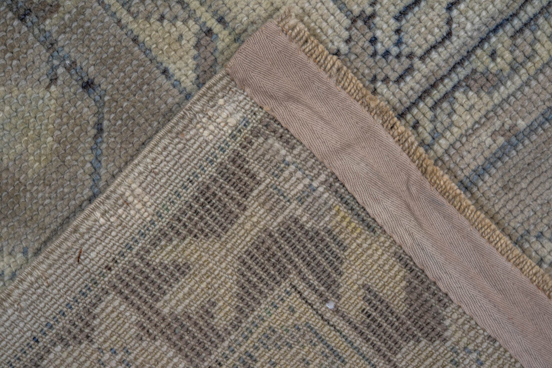 9' x 12' one-of-a-kind handmade antique Oushak large size rug. Color palette: ivory, taupe, beige, brown, pale blue, camel