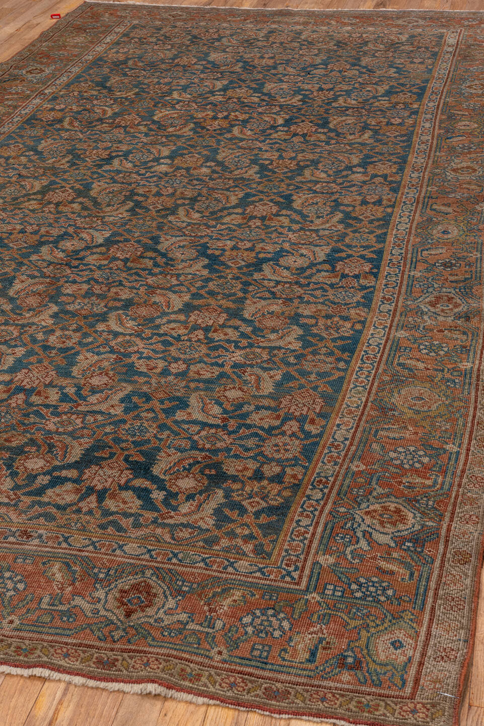5' x 11' one-of-a-kind handmade antique Bidjar rug. Color palette: rust, blue, ivory, camel, slate, taupe, gold, terracotta