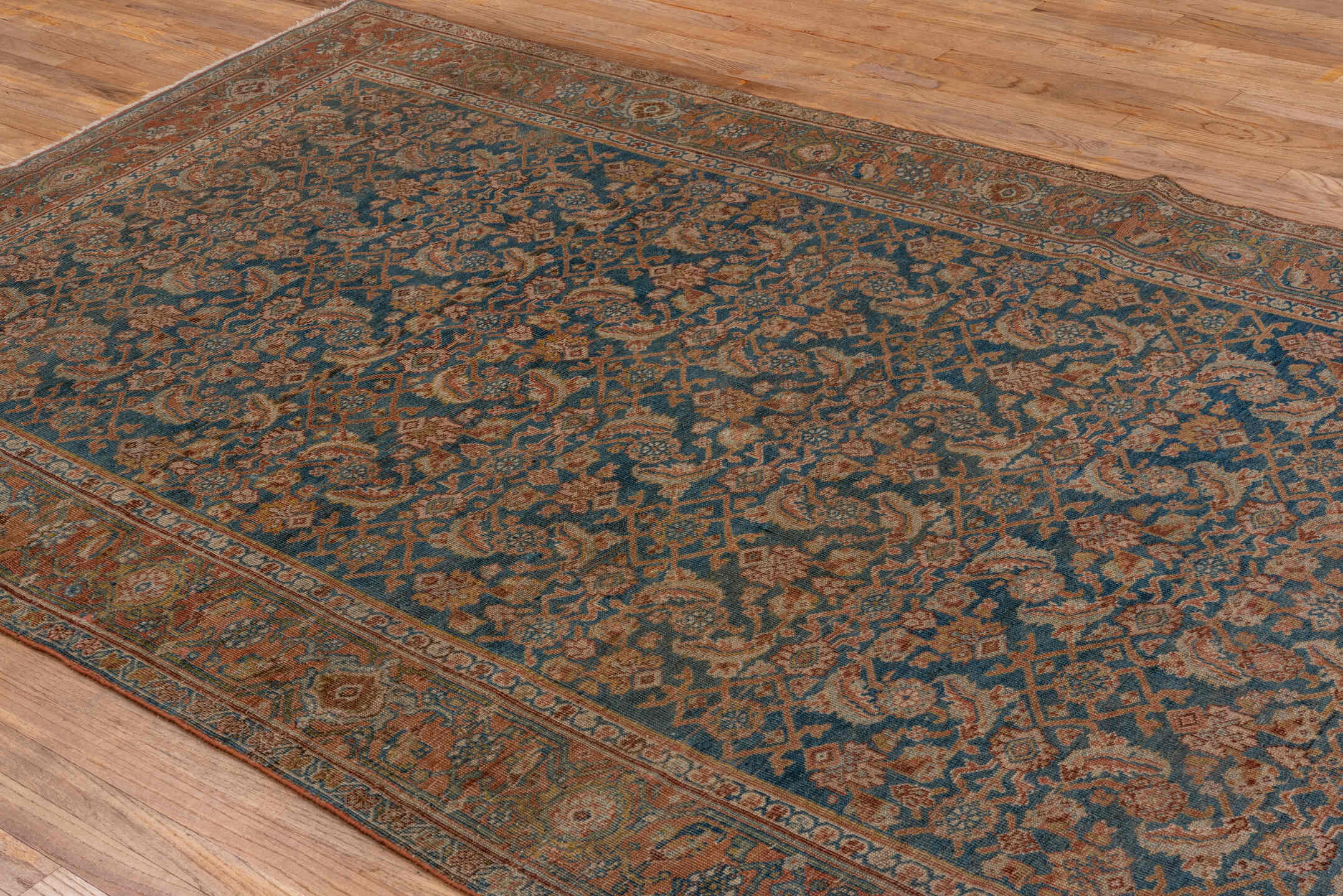 5' x 11' one-of-a-kind handmade antique Bidjar rug. Color palette: rust, blue, ivory, camel, slate, taupe, gold, terracotta