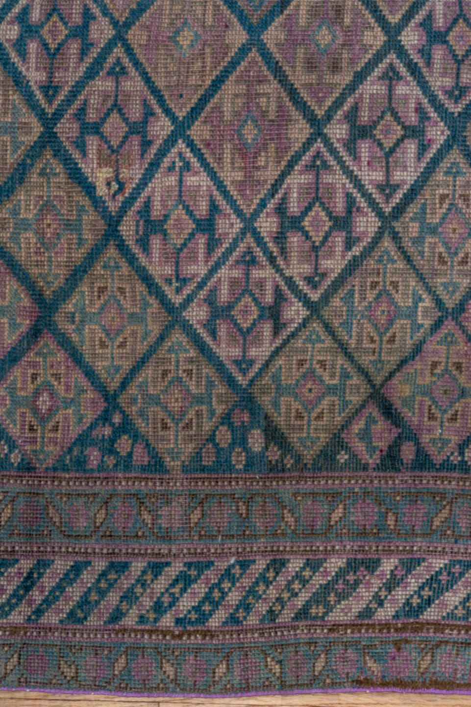 4' x 7' one-of-a-kind handmade antique Qashqai rug. Color palette: taupe, indigo, mauve, dusty rose, ivory, slate, camel