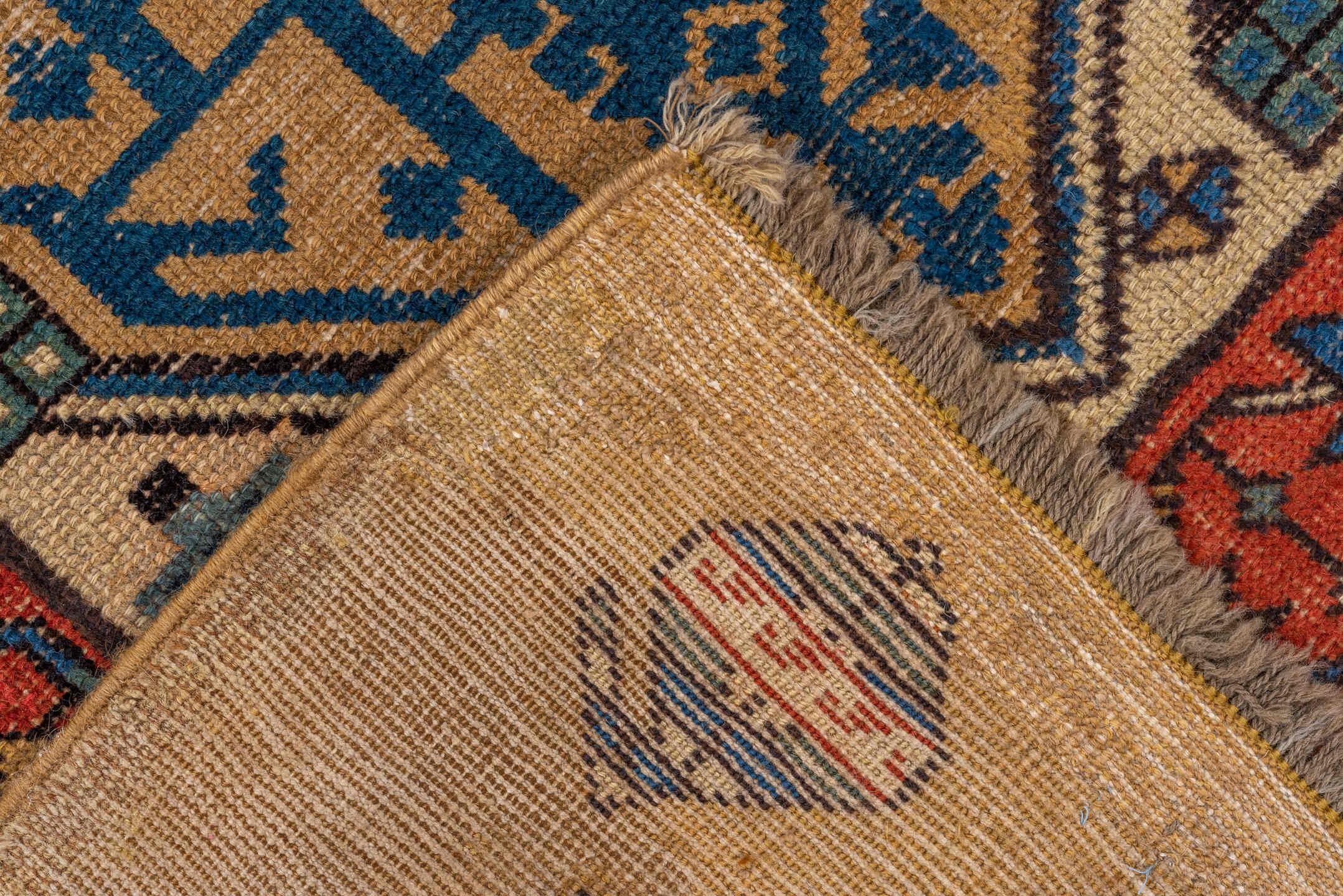3' x 10' one-of-a-kind handmade antique Sarab runner rug. Color palette: camel, indigo, ivory, rust, terra cotta, navy