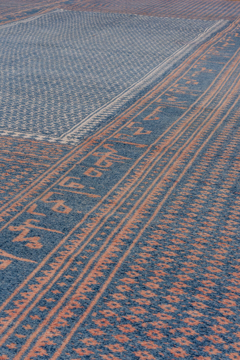 10' x 17' one-of-a-kind handmade antique Kilim rug. Color palette: blue, rose, ivory, pink, red