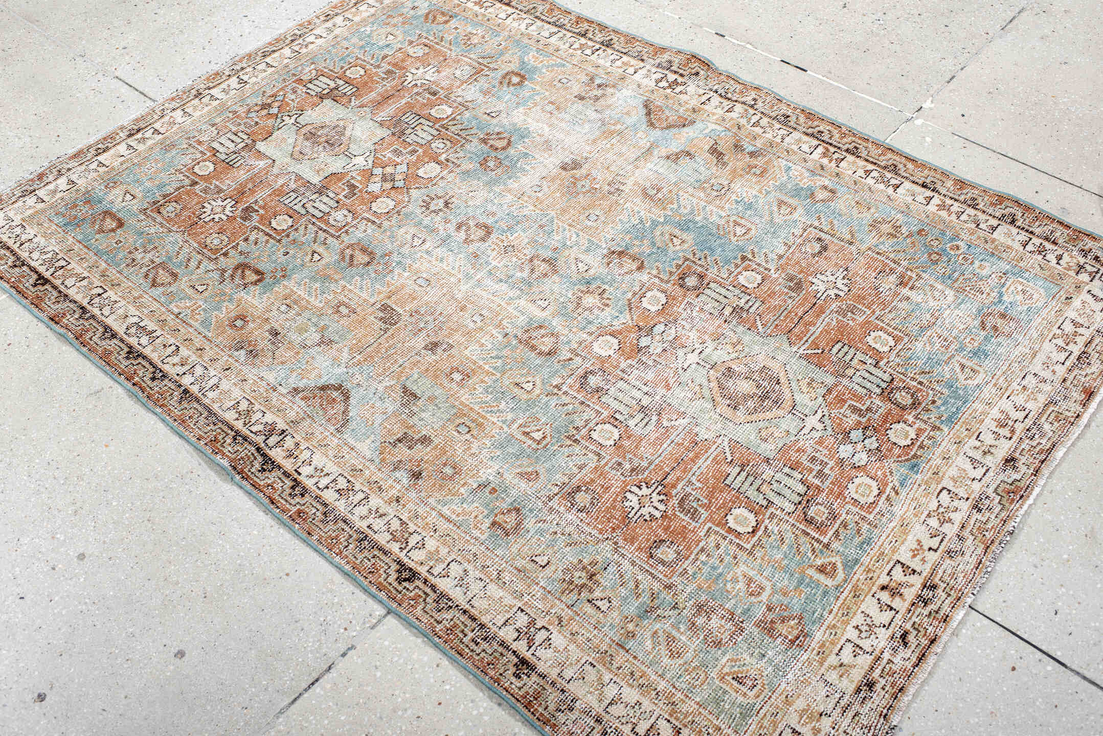 4' x 6' one-of-a-kind handmade antique Afshar small size rug. Color palette: ivory, light blue, camel, rust, taupe, brown
