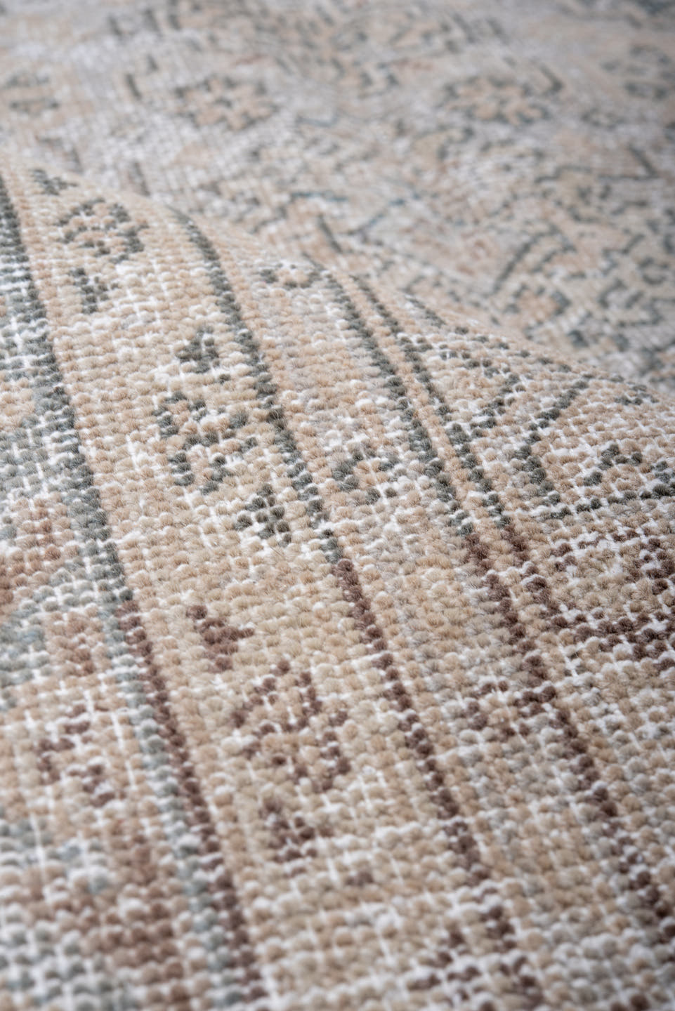 5' x 7' one-of-a-kind handmade antique Veece rug. Color palette: beige, ivory, taupe, slate, pale blue, brown, gray