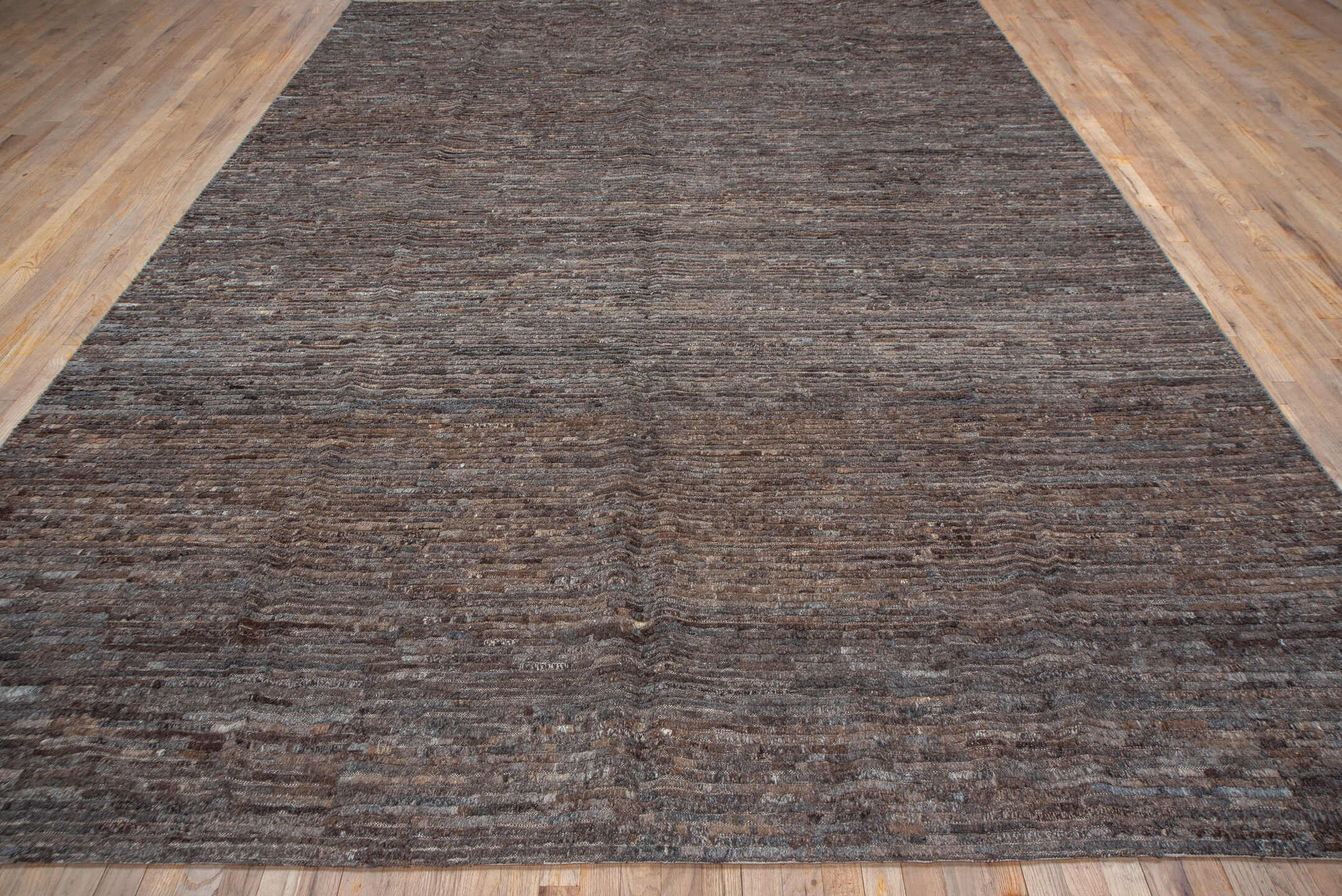 9' x 12' one-of-a-kind handmade vintage Tulu large size rug. Color palette: taupe, brown, charcoal, mushroom, espresso