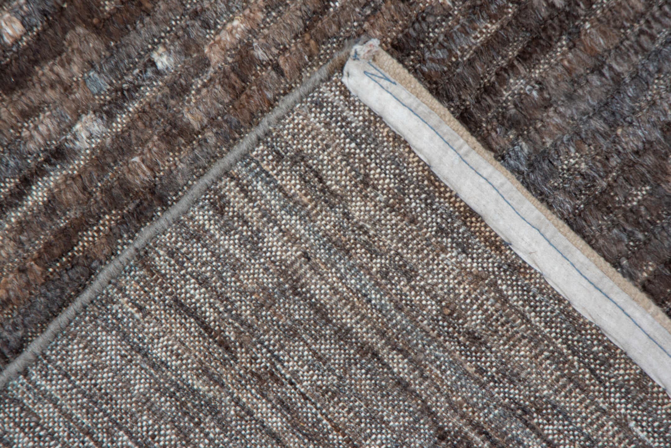 9' x 12' one-of-a-kind handmade vintage Tulu large size rug. Color palette: taupe, brown, charcoal, mushroom, espresso