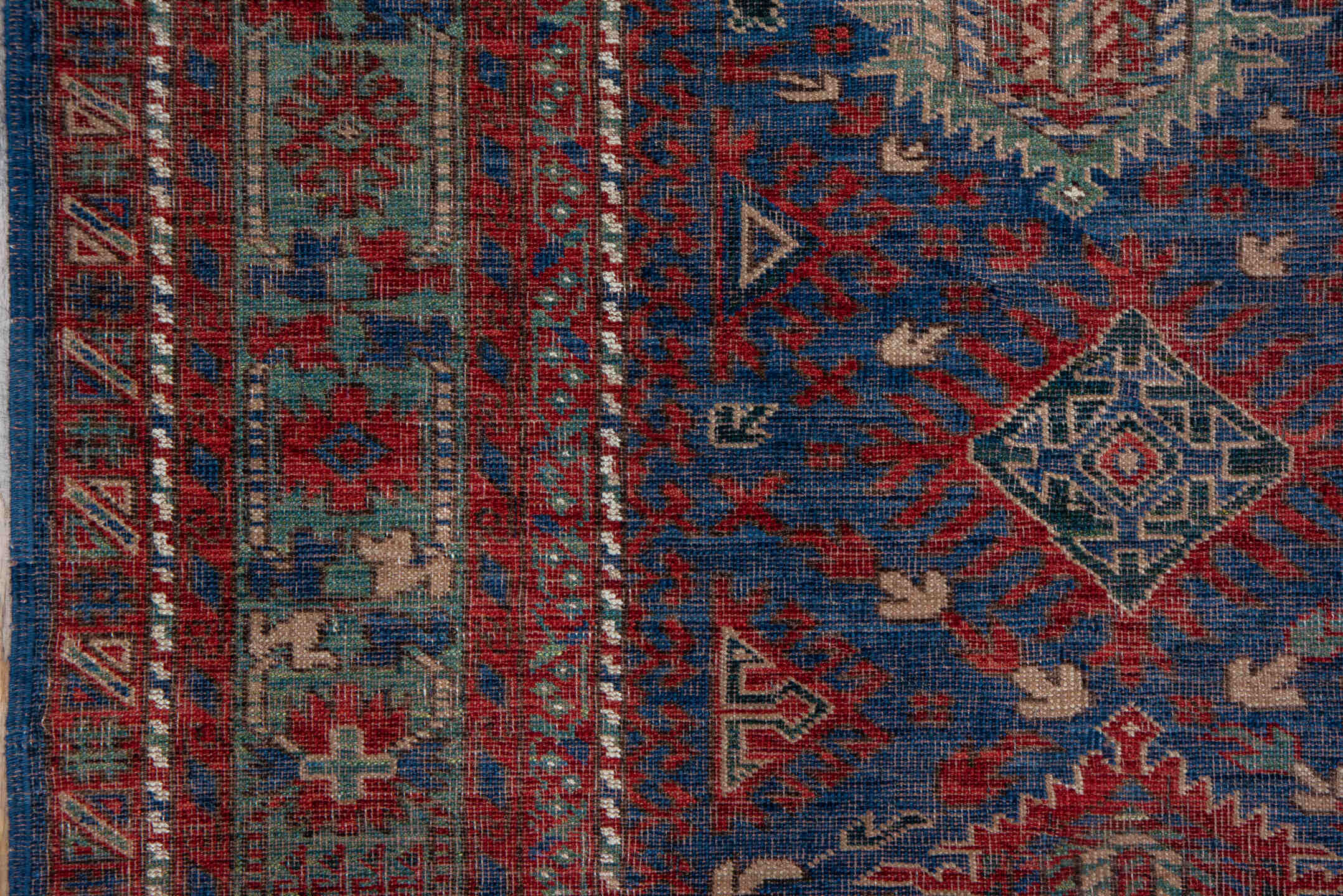 5' x 8' one-of-a-kind handmade vintage Shirvan medium size rug. Color palette: blue, brown, gray, pink, red, redwood