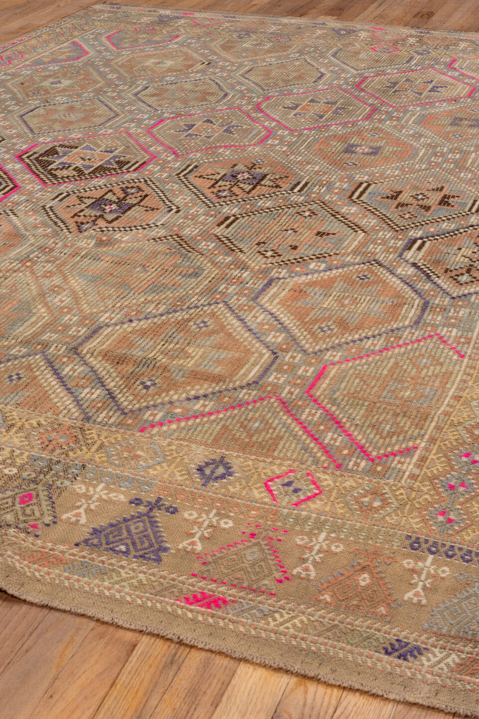 6' x 9' one-of-a-kind handmade antique Jijim medium size rug. Color palette: camel, taupe, rose, ivory, slate, violet, sand