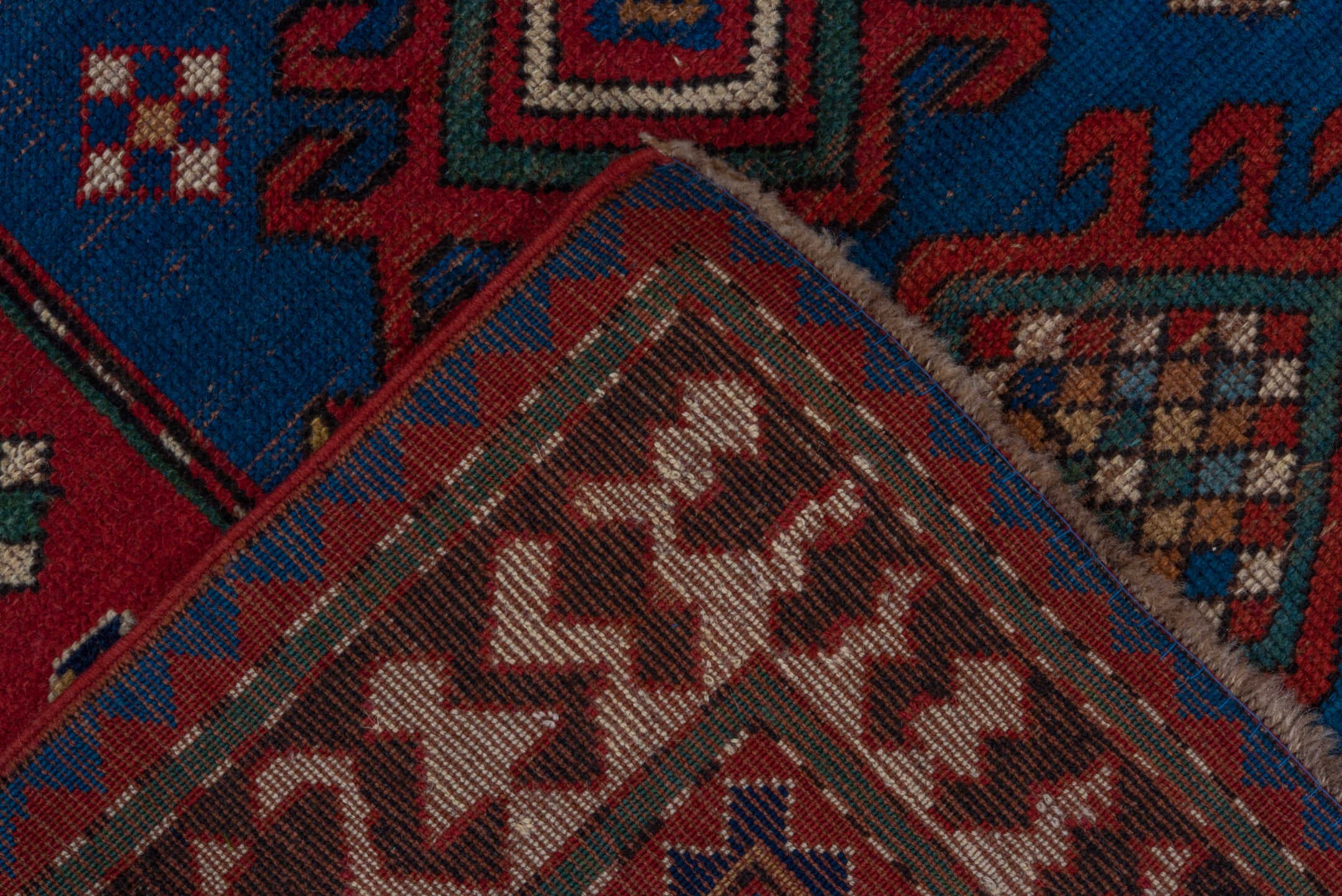 3' x 6' one-of-a-kind handmade antique Kazak small size rug. Color palette: blue, rust, ivory, navy, crimson, gold, teal