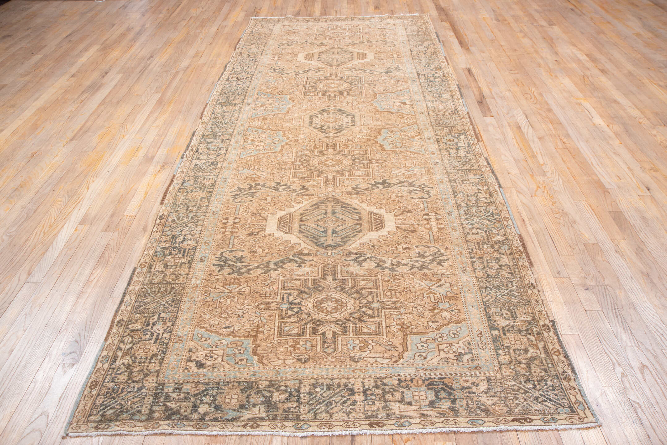 5' x 12' one-of-a-kind handmade antique Karaje runner rug. Color palette: ivory, taupe, camel, brown, pale blue, charcoal