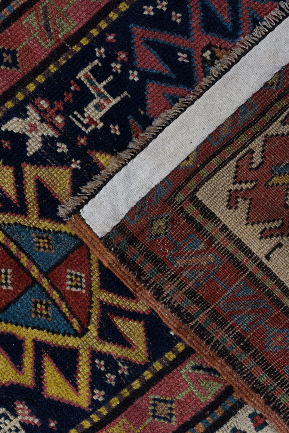 3' x 11' one-of-a-kind handmade vintage Caucasian runner rug. Color palette: navy, ivory, rust, rose, soft blue, taupe