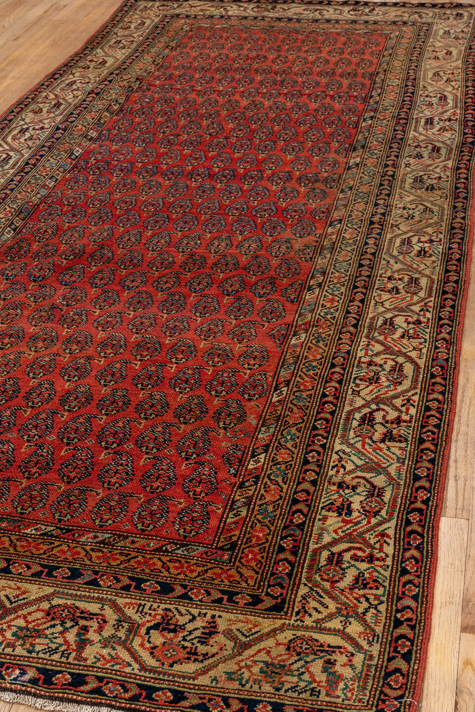 4' x 11' one-of-a-kind handmade antique Saraband runner rug. Color palette: rust, ivory, navy, camel, terracotta, charcoal