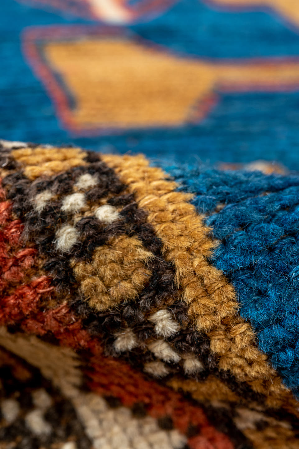 4' x 5' one-of-a-kind handmade antique Kazak small size rug. Color palette: blue, ivory, rust, navy, camel, coral