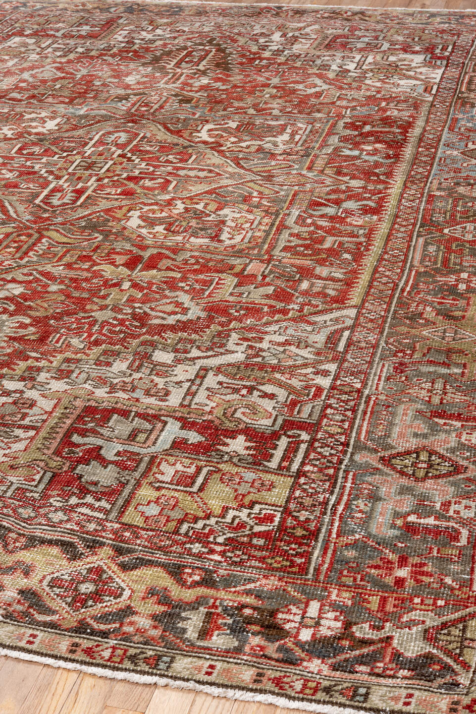 8' x 11' one-of-a-kind handmade antique Heriz large size rug. Color palette: ivory, rust, brick red, taupe, brown