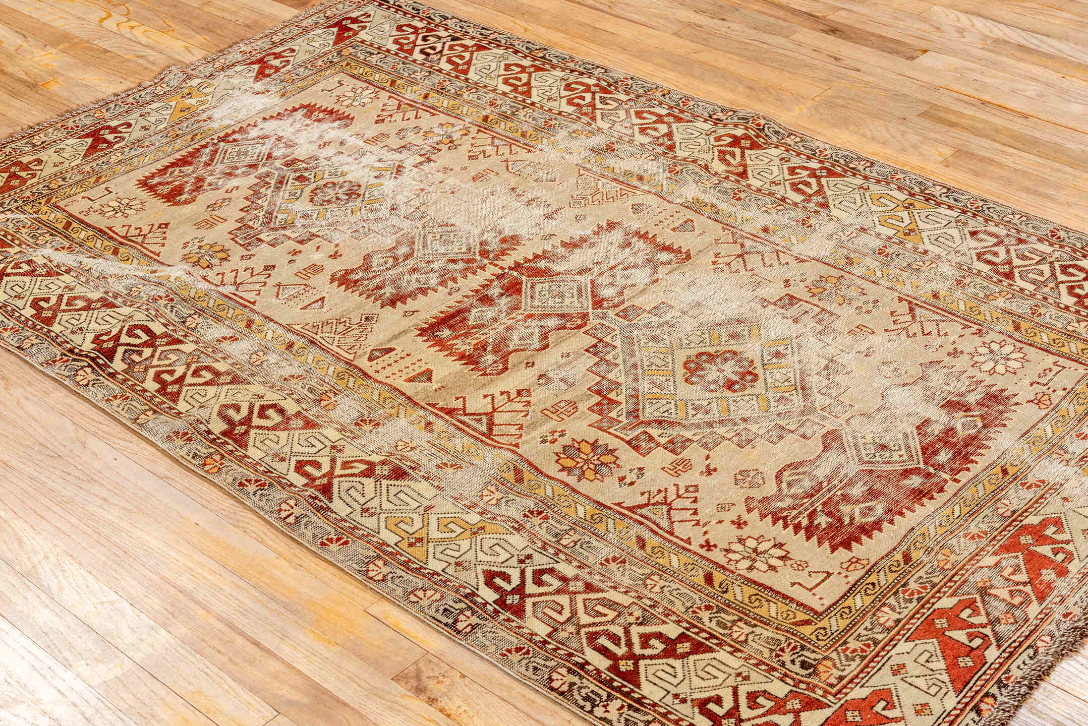 4' x 6' one-of-a-kind handmade antique Shirvan small size rug. Color palette: ivory, rust, camel, taupe, gold, brown