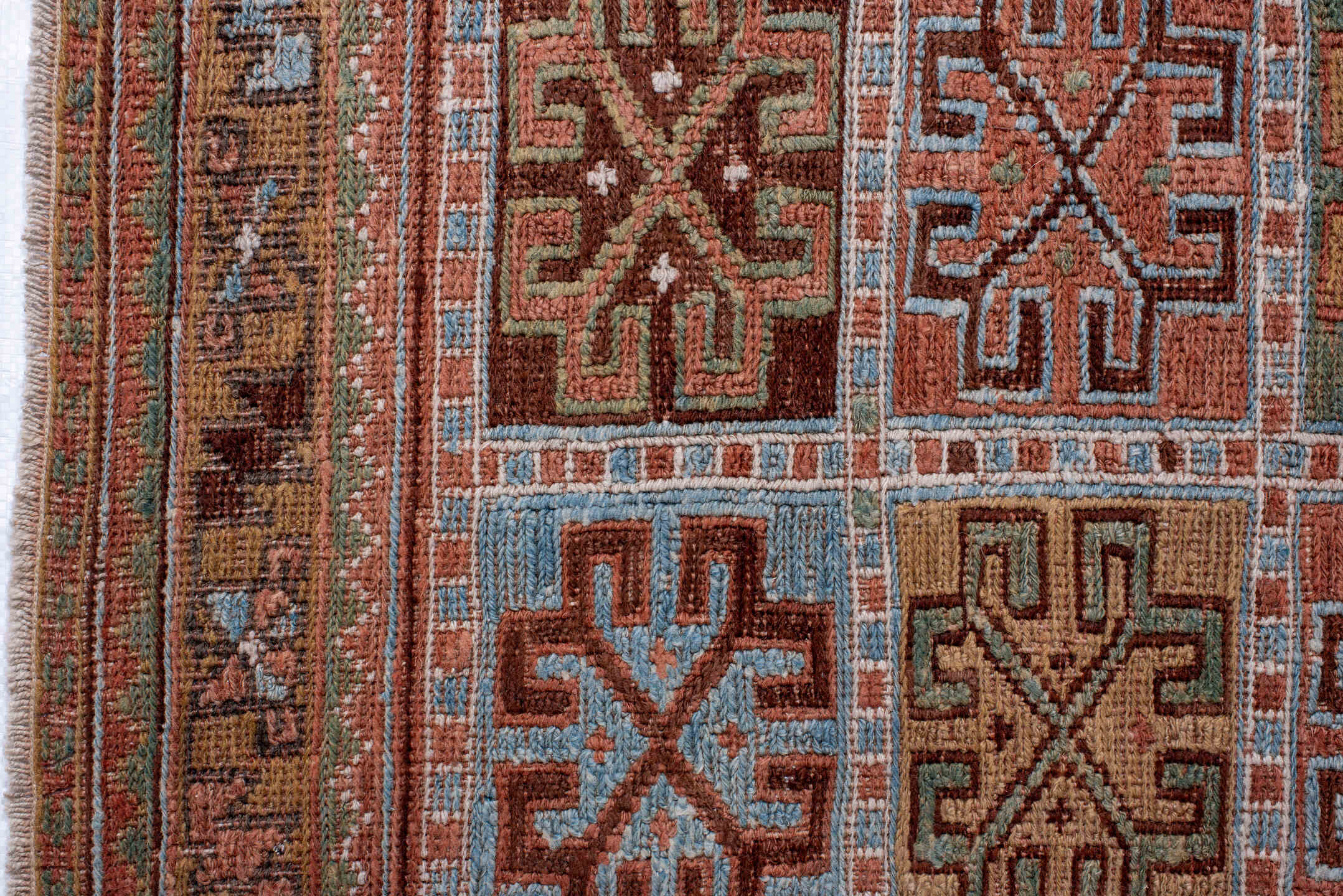 2' x 4' one-of-a-kind handmade antique Sumak small size rug. Color palette: rust, camel, sky blue, ivory, olive, brown