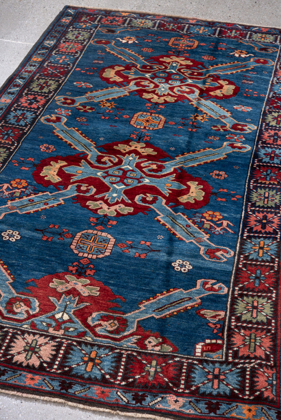 3' x 6' one-of-a-kind handmade antique Kuba small size rug. Color palette: blue, crimson, ivory, sky blue, pink, navy, sage