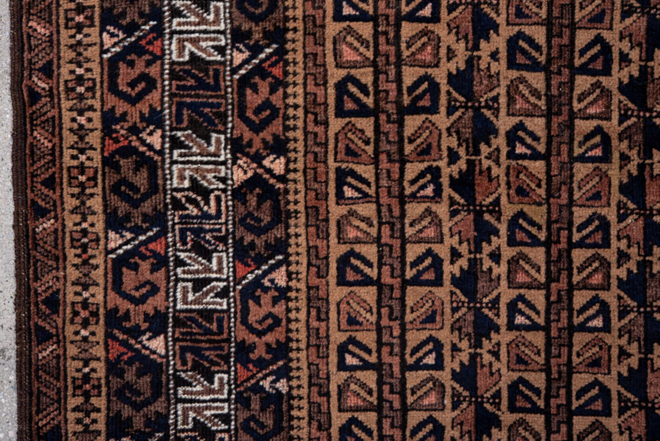 3' x 4' one-of-a-kind handmade antique Belouch small size rug. Color palette: brown, camel, rust, ivory, charcoal, rose