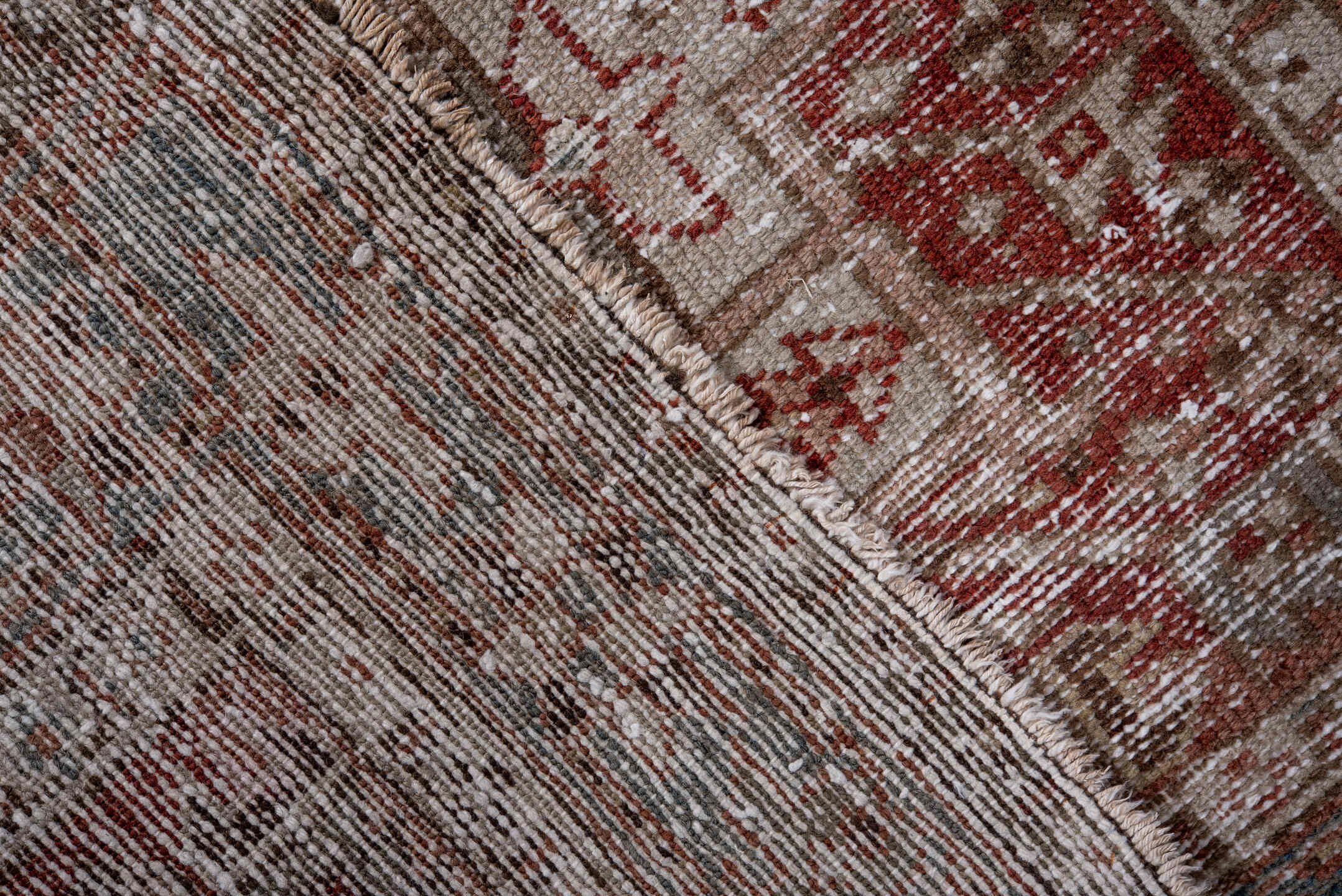 2' x 11' one-of-a-kind handmade vintage Karaje runner rug. Color palette: gray, light gray, pink, brown, off-white, red