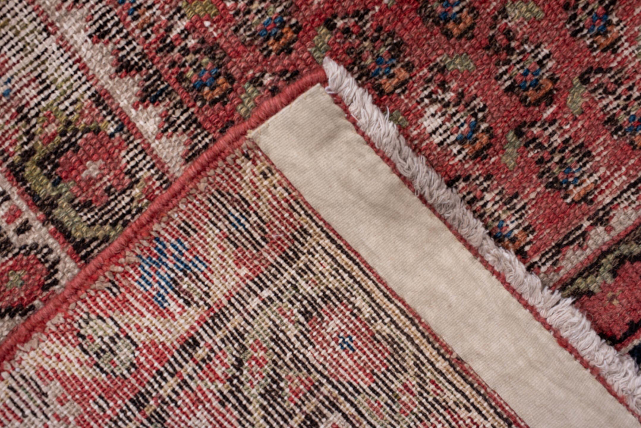 6' x 16' one-of-a-kind handmade antique Saraband rug. Color palette: rose, ivory, rust, terra cotta, taupe, charcoal, sage
