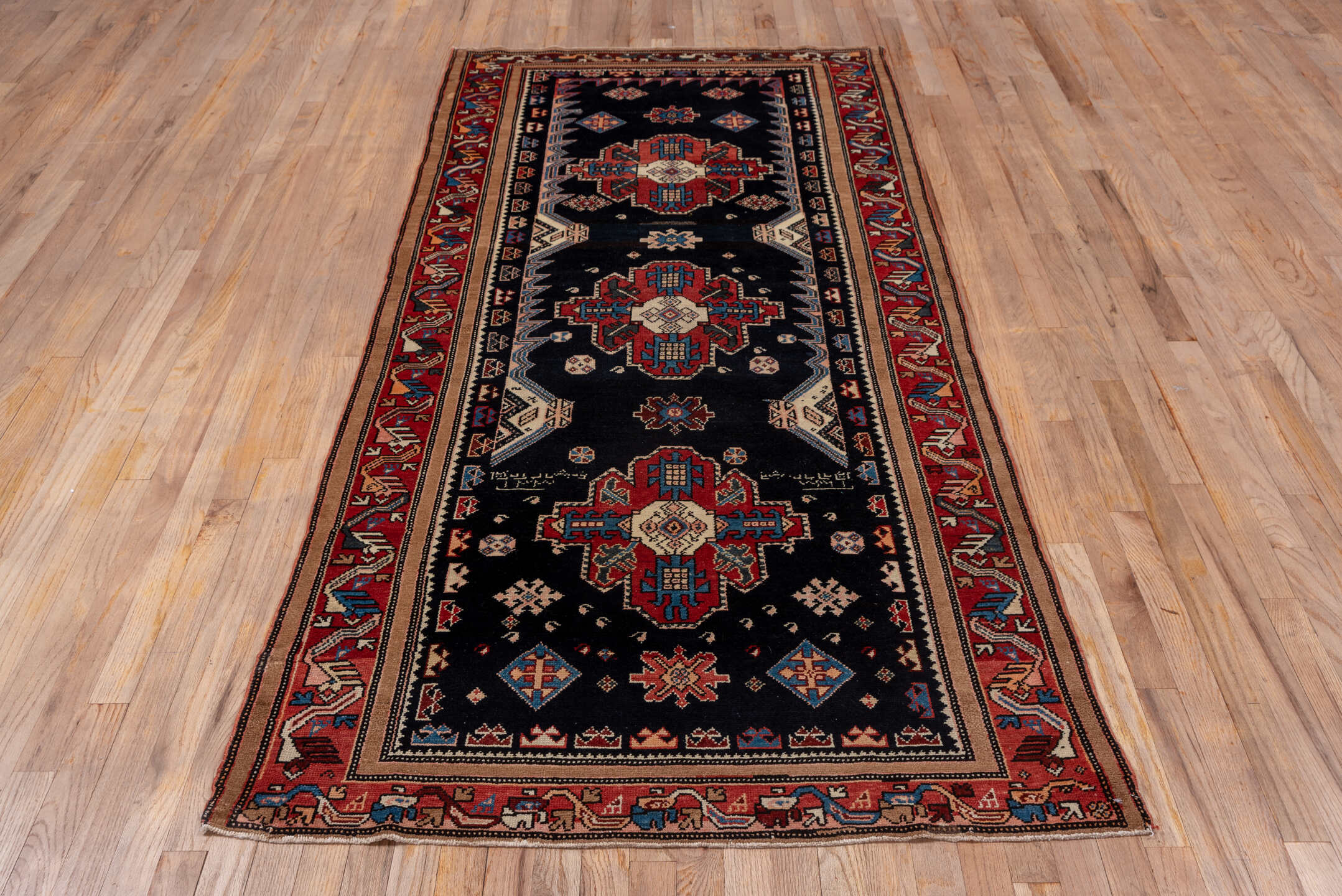 3' x 8' one-of-a-kind handmade vintage Malayer runner rug. Color palette: black, blue, brown, gray, pink, red