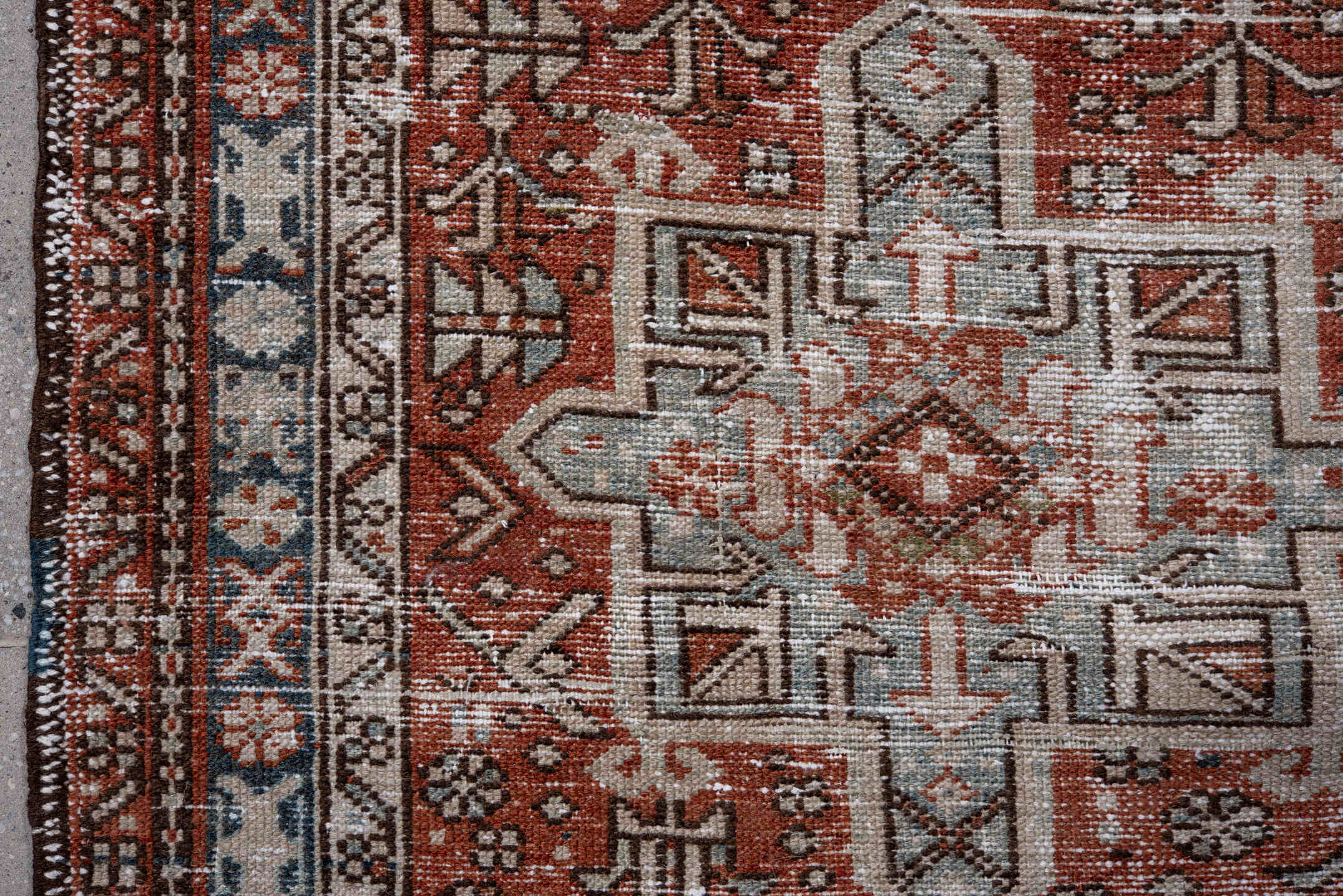 2' x 10' one-of-a-kind handmade antique Karaje runner rug. Color palette: rust, ivory, blue, brown, taupe, sage, terracotta